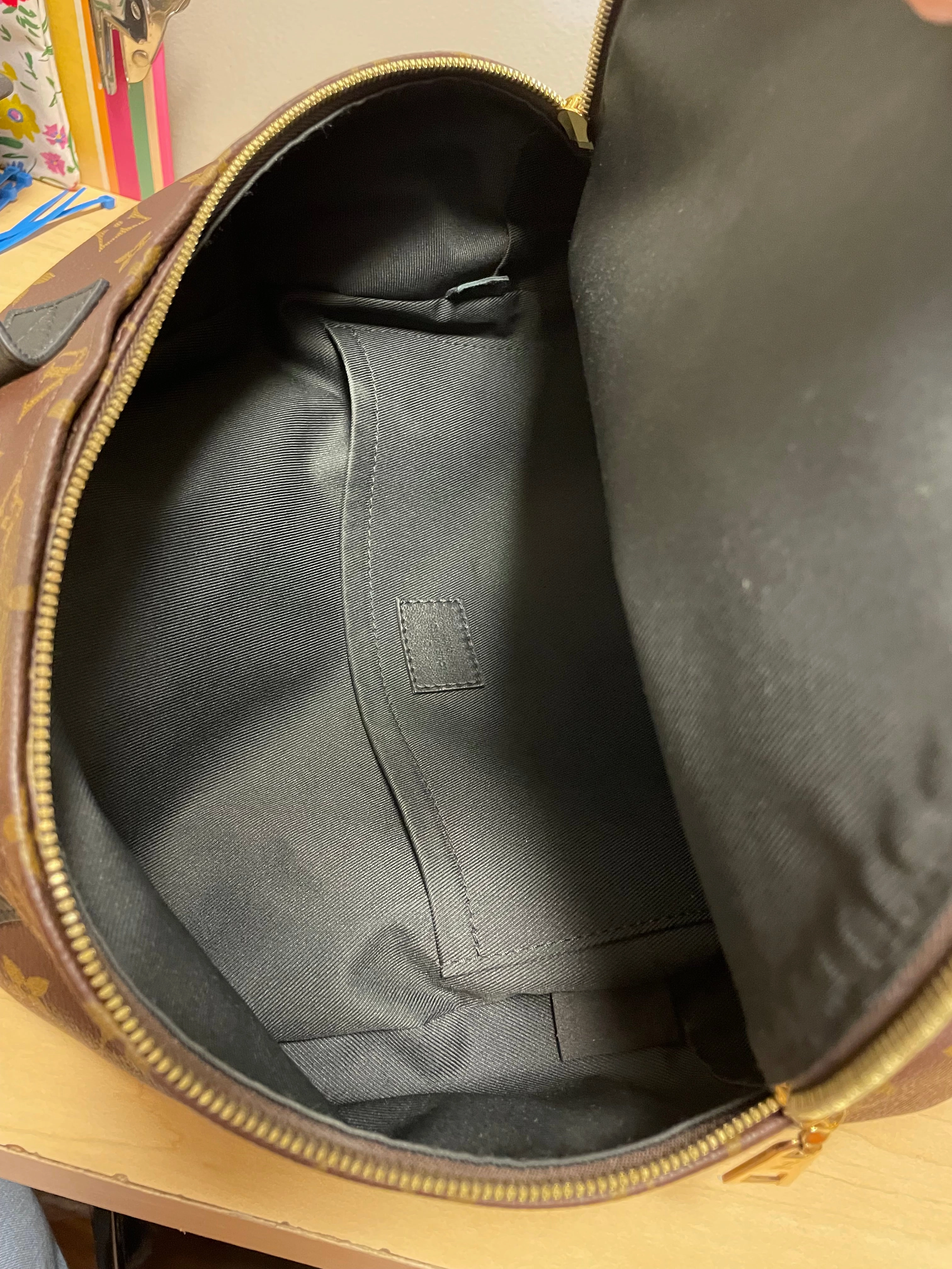Backpack Luxury Designer By Louis Vuitton, Size: Medium