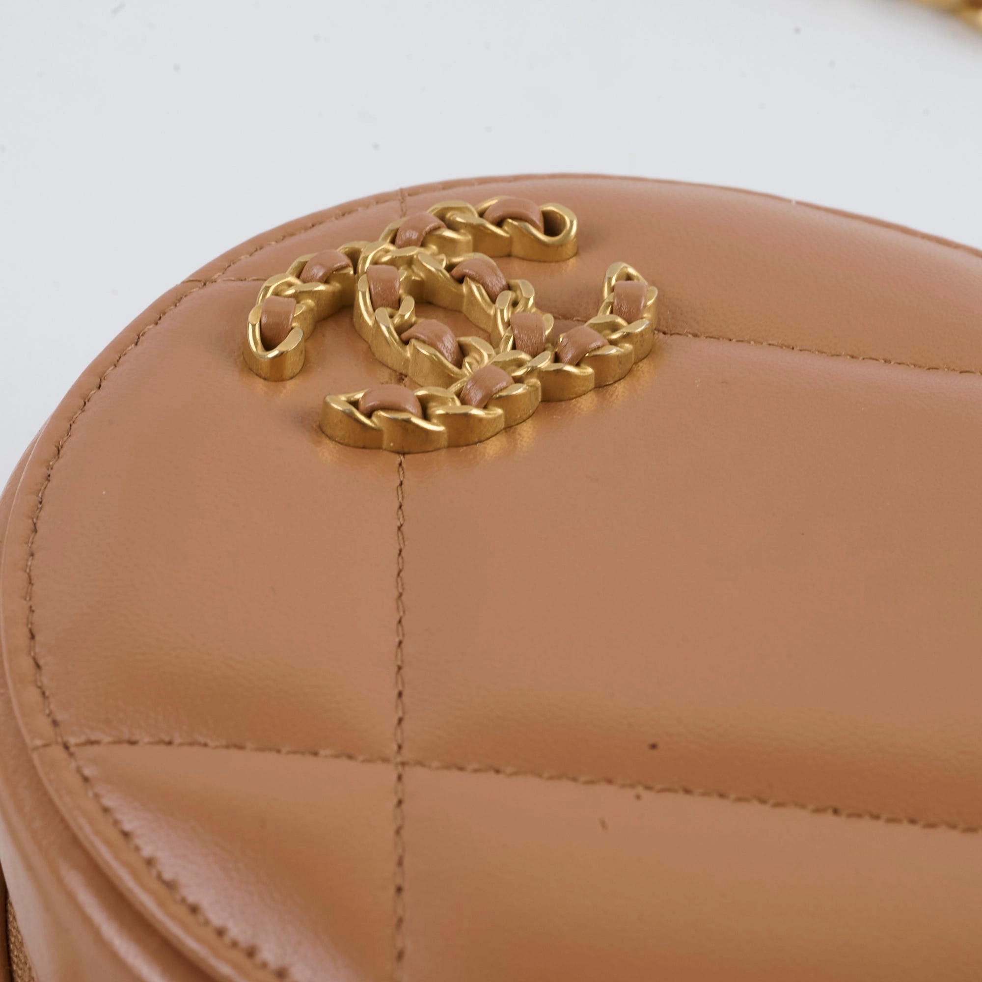 Chanel 19 Round Clutch Lambskin Tan