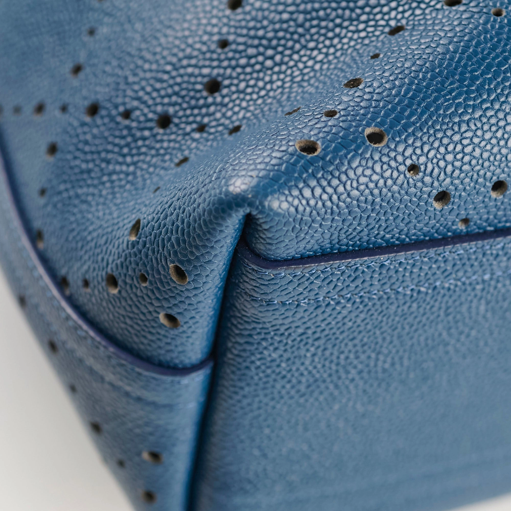 Chanel Perforated Drawstring Bucket Bag Blue