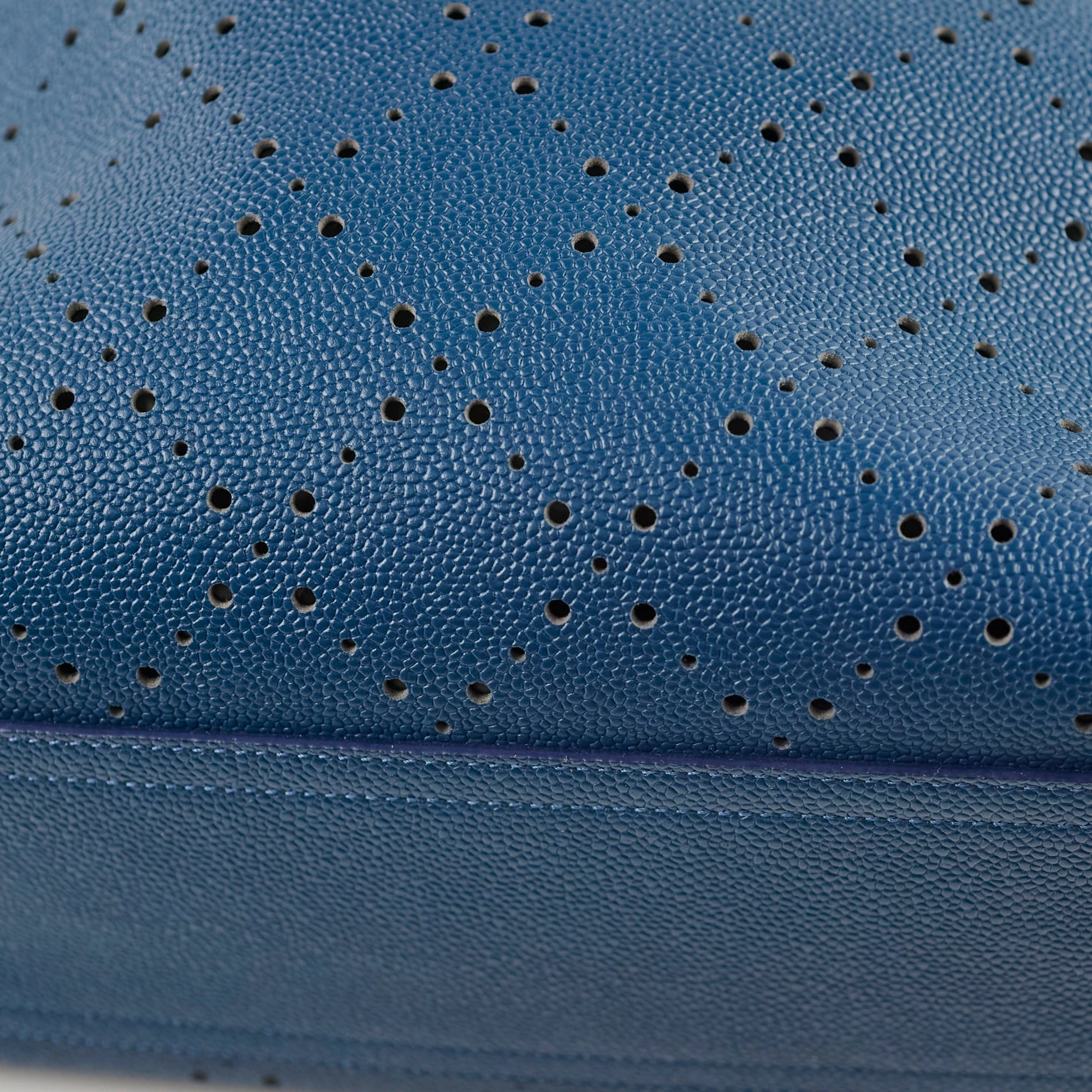Chanel Perforated Drawstring Bucket Bag Blue