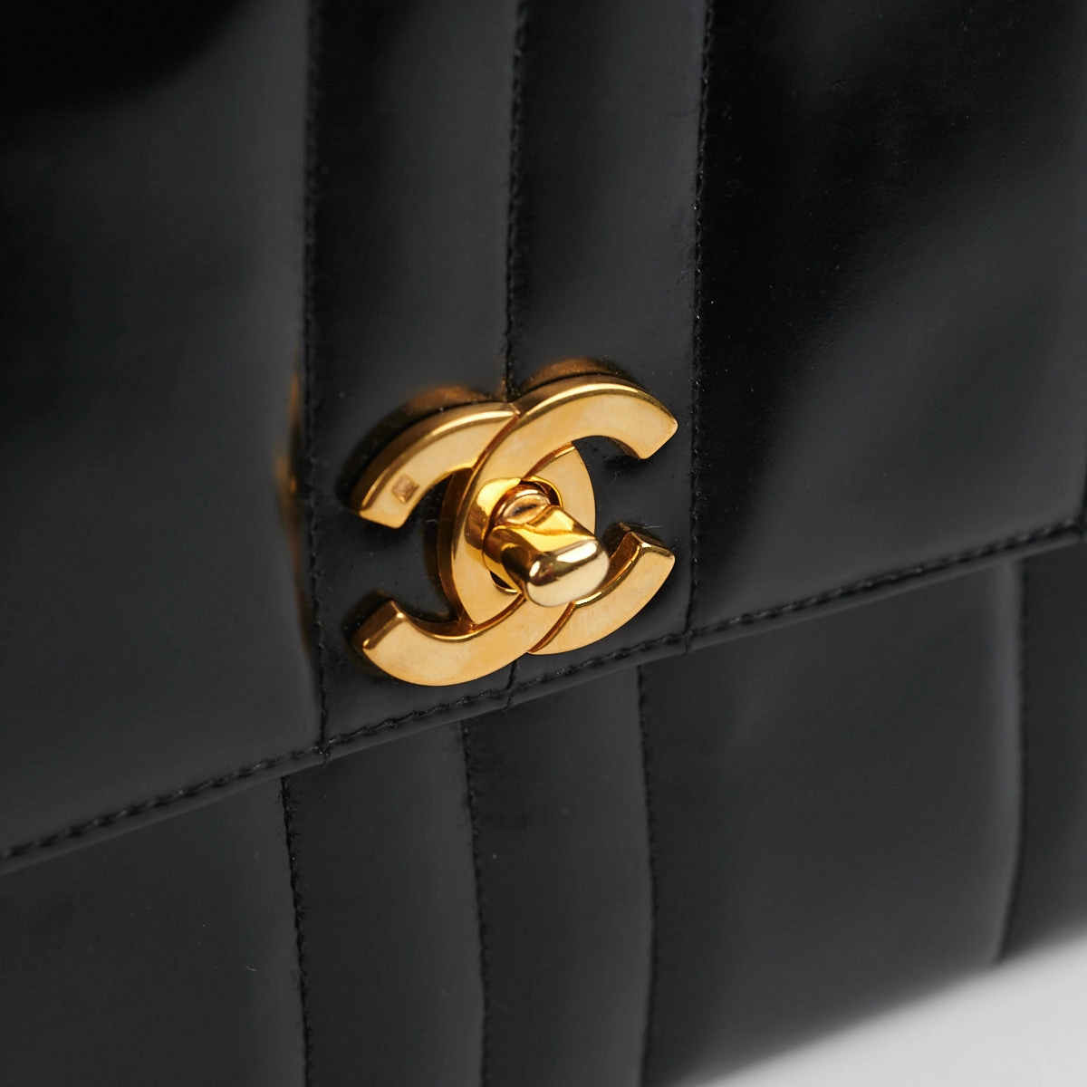 Chanel Vintage Vertical Half Flap Black Shiny Leather