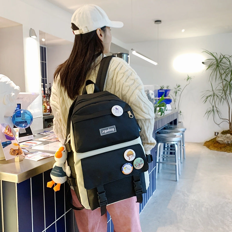 Korean style color matching four piece backpack