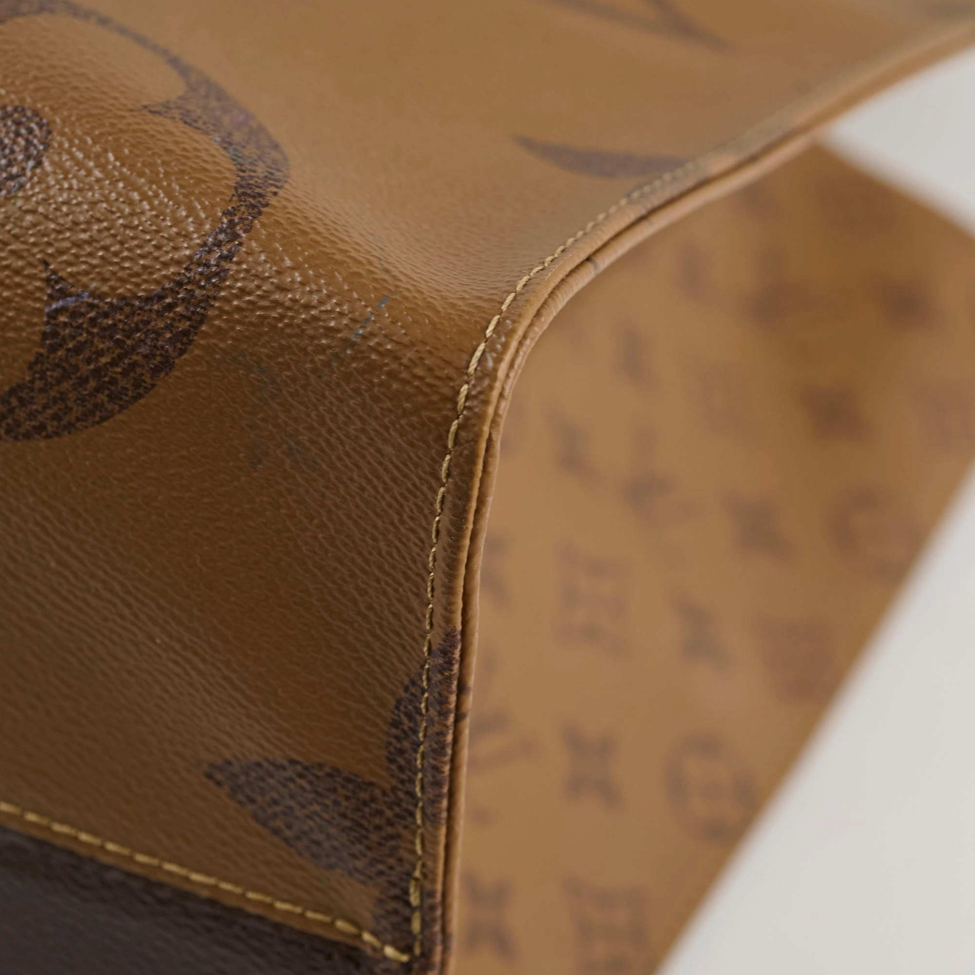 Louis Vuitton On The Go GM Reverse Monogram Micorchip