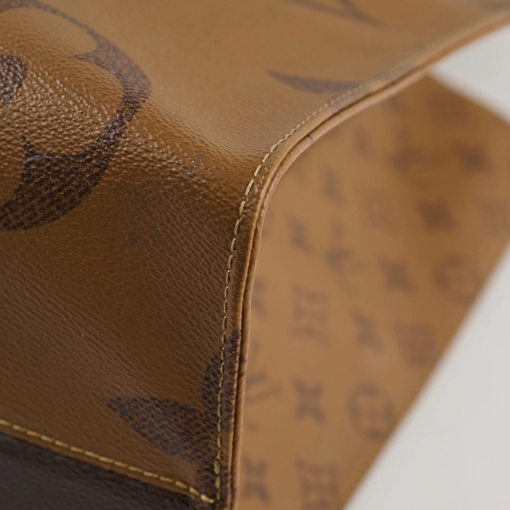 Louis Vuitton On The Go GM Reverse Monogram Micorchip