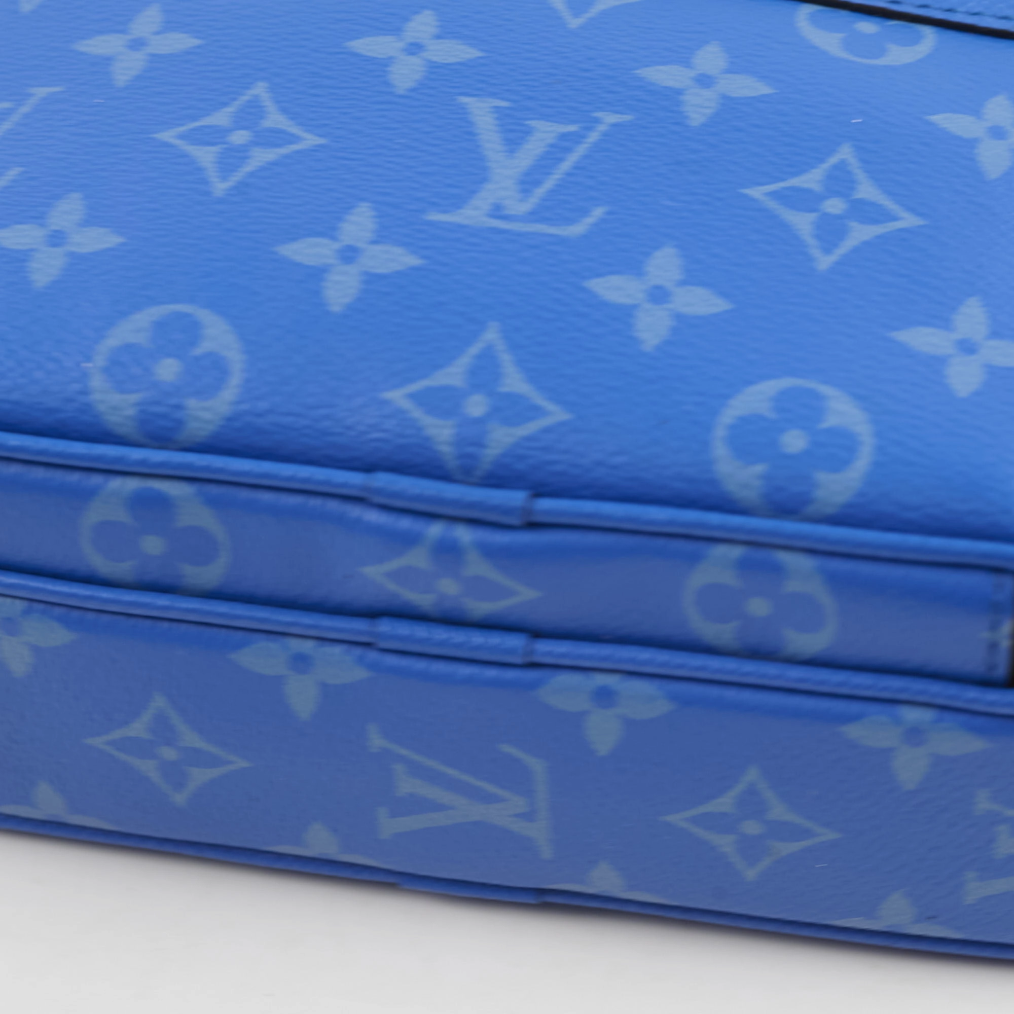Louis Vuitton Taigarama Leather Messenger Bag Blue