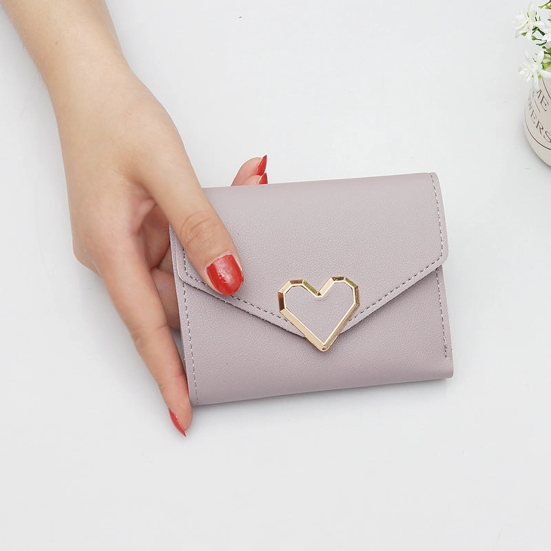Multifunctional folding wallet