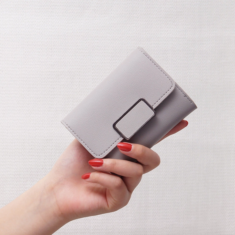 Multifunctional folding wallet