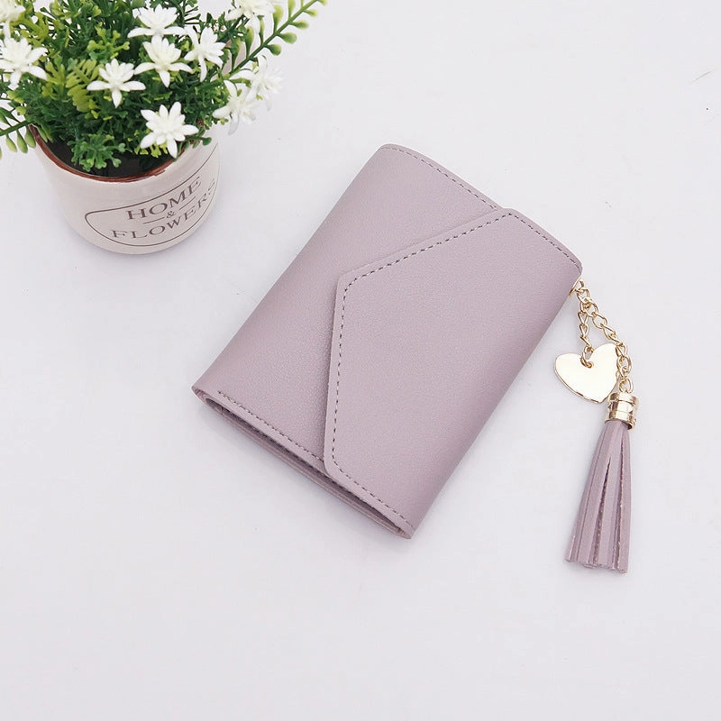 Multifunctional folding wallet